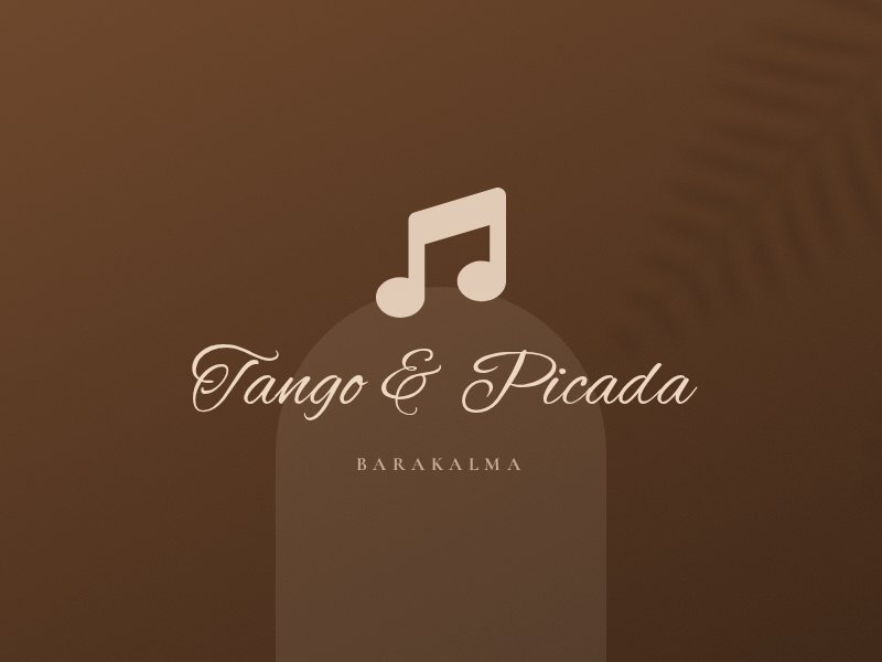 Pareja bailando tango en un salón de luz cálida